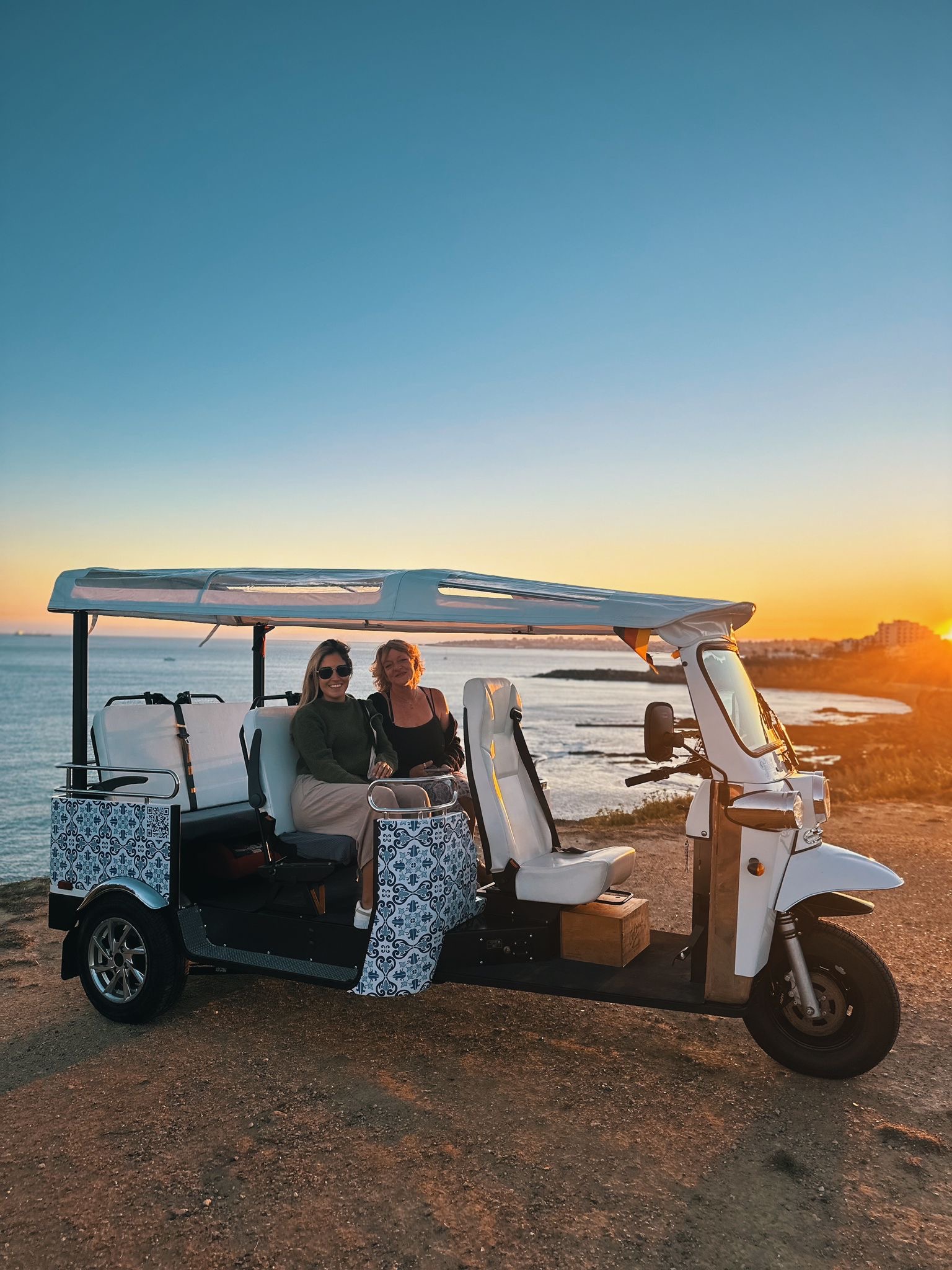 Electric tuk tuk touring the streets of Lisbon