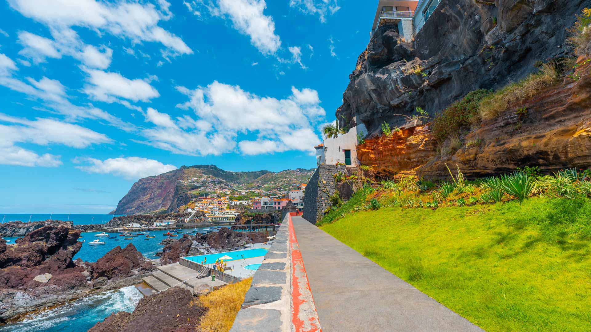 Promenade de Câmara de Lobos waterfront, Madeira — scenic coastal walk along the fishing village bay