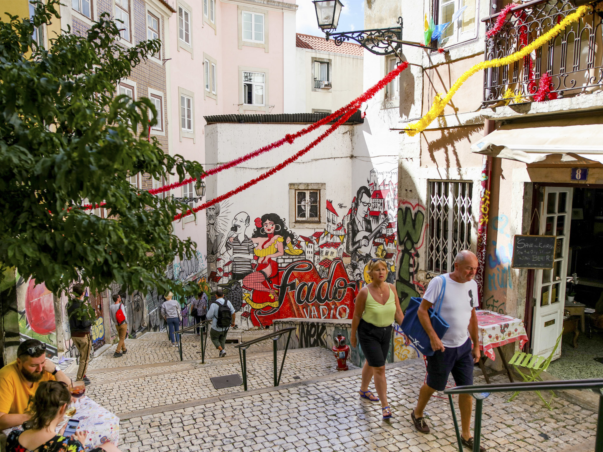 Street art Lisbon tuk tuk tour — colourful urban mural in one of Lisbon's best known street art neighbourhoods